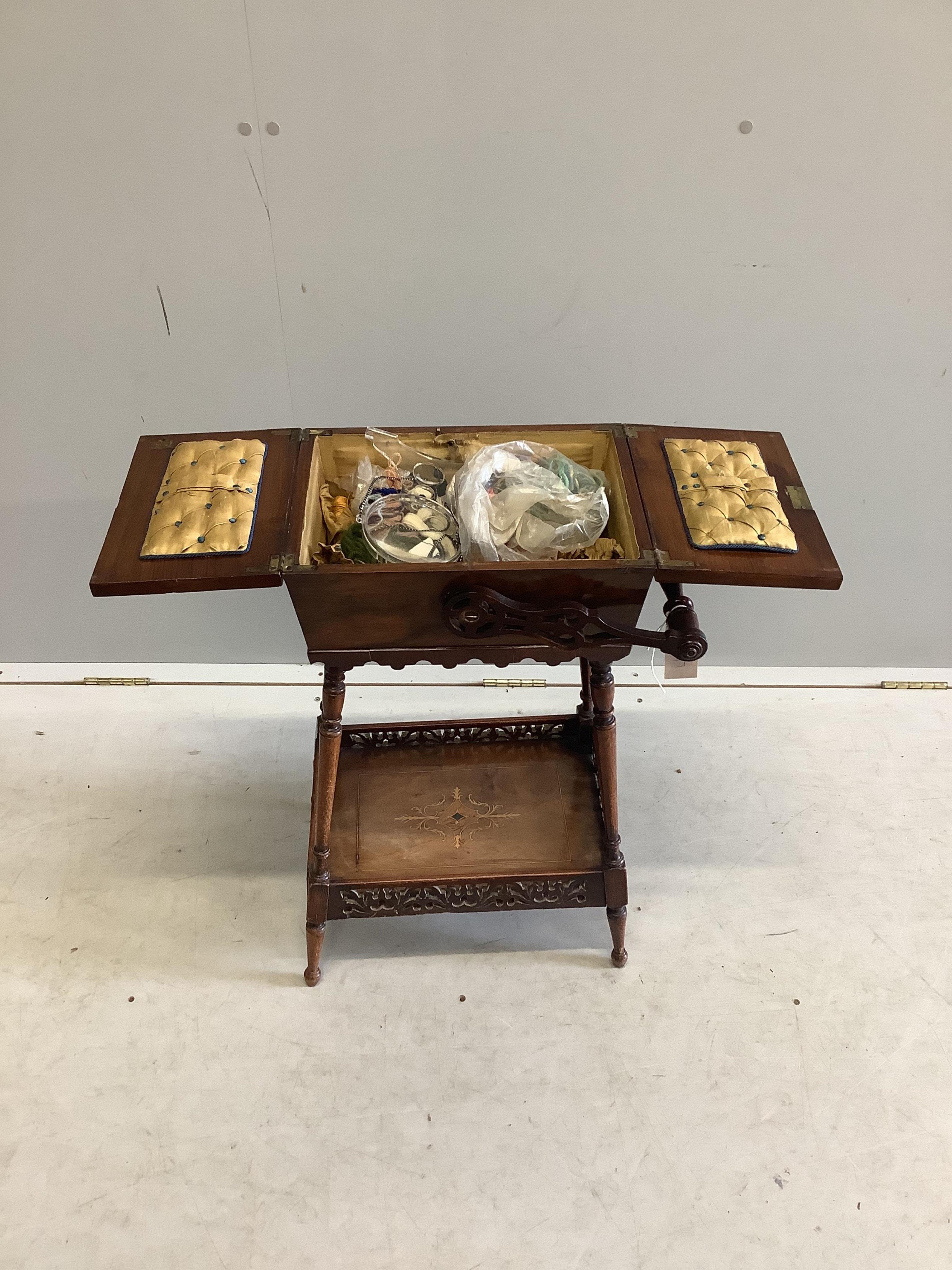 A 19th century Continental marquetry inlaid walnut sewing box having twin flap top, galleried undertier and swing handle, width 40cm, depth 30cm, height 86cm. Condition - fair